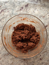 Glass bowl with chocolate dough on a marble countertop – thumbnail 8