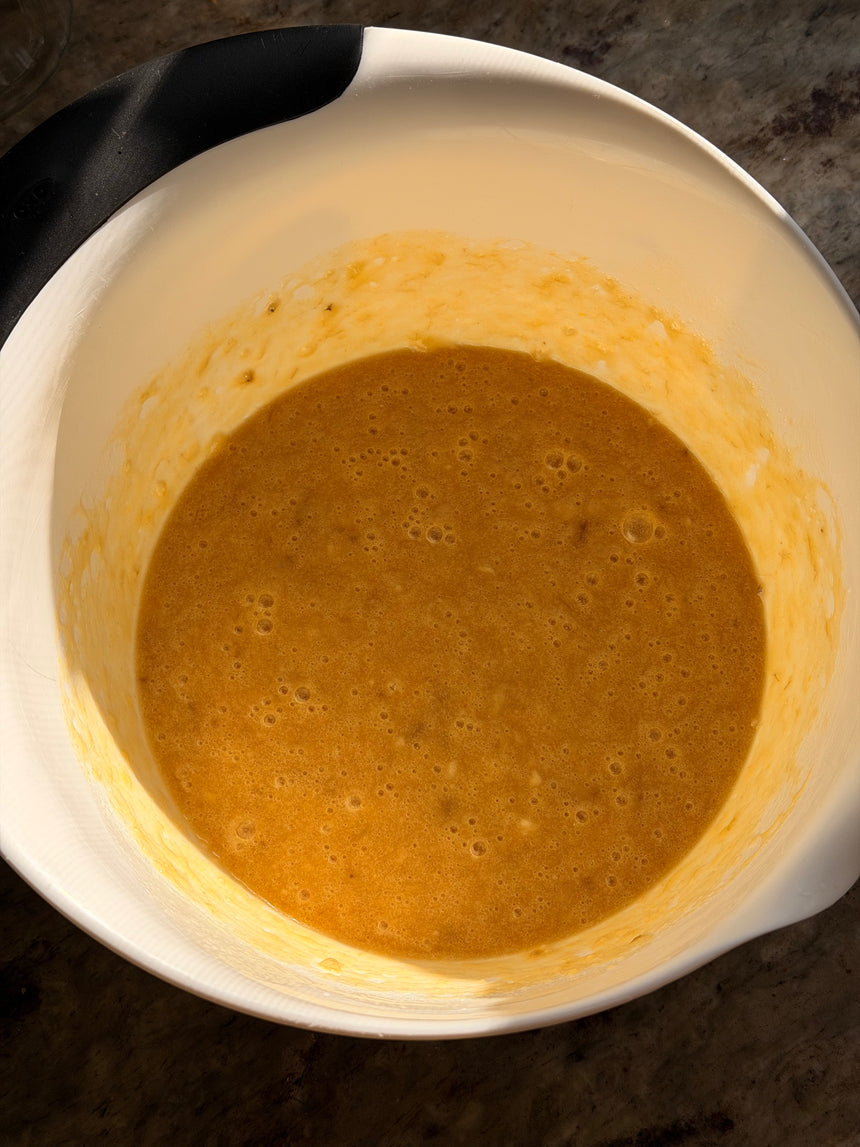Brown liquid in a white bowl on a dark surface – photo 5