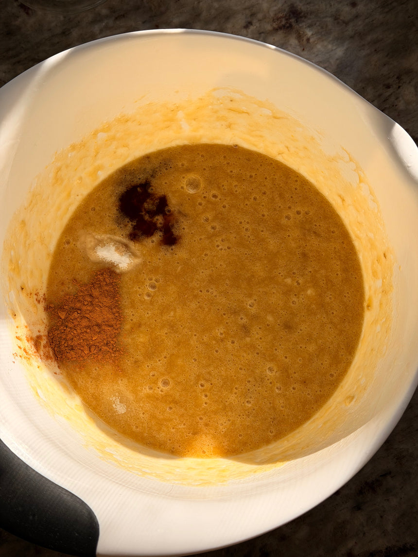 Brown liquid in a white container with a dark background – photo 6