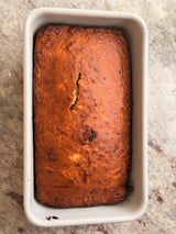 Loaf of bread in a baking pan on a marble surface – thumbnail 11